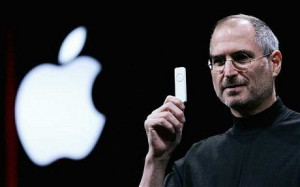 Apple CEO Steve Jobs holds a new iPod shuffle MP3 player at the 2005 ...