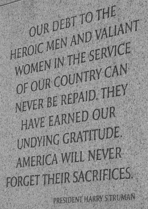 reads: “Our debt to the heroic men and valiant women in the service ...