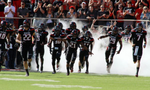 oct 12 2013 lubbock tx usa the texas tech red raiders enter the field ...