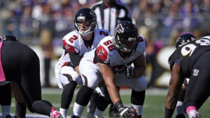Atlanta Falcons quarterback Matt Ryan (2) lines up for a play behind ...