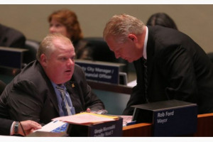 Mayor Rob Ford and his brother, Councillor Doug Ford, chat in the ...