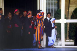 Mother Teresa waits at the Vatican to greet Pope John Paul II. Franco ...
