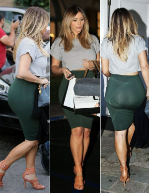 Kim Kardashian showing off her mama curves in her high-waisted skirt ...