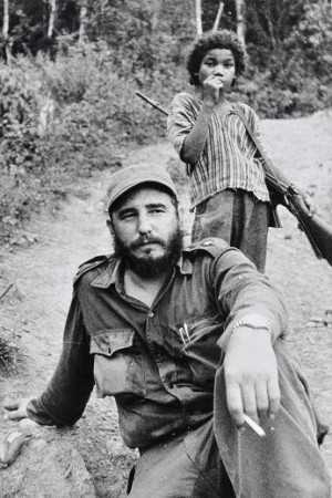 Fidel Castro with a ‘child guardian’ in the Cuban jungle