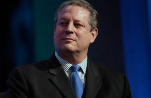 Former U.S. Vice President Al Gore speaks next to rapper Pharell ...