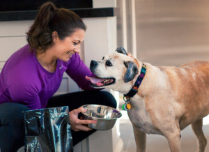 Misty May-Treanor works out with her dog