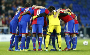 FC Basel's players huddle together before their Champions League Group ...