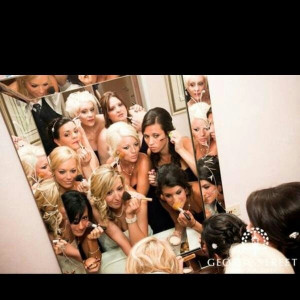 Bride and bridesmaids getting ready for wedding. Wedding photo ideas