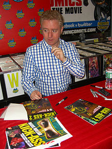 Creator Mark Millar signing posters for the movie and copies of the ...