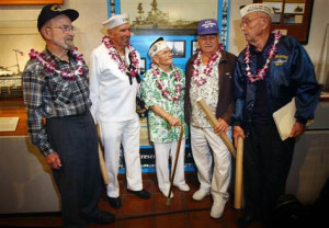 Image: Veterans at the USS Oklahoma exhibit.