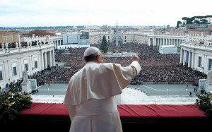 Pope Francis gives a Christmas blessing from the balcony of St. Peter ...