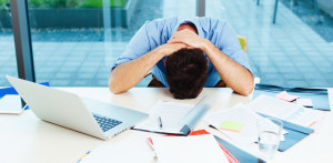 frustrated at work 520x255 Why entrepreneurs are obsessed with ...