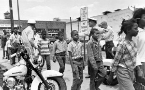 May 4, 1963 file photo shows policemen leading a group of black school ...