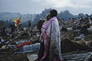 couple hug at Woodstock - 1969