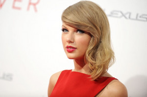 Taylor Swift attends 'The Giver' premiere at Ziegfeld Theater on ...