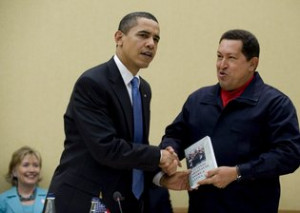 Hugo Chávez, president of Venezuela, handing President Obama a copy ...