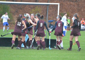Granby’s Olivia Johnson celebrates with her teammates after scoring ...