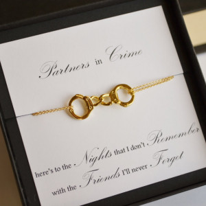 Partners in crime....gold hand cuff linked by lebijouxbee on etsy