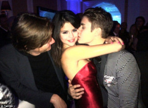 Birthday kiss: Justin only had eyes for Selena as they partied over ...