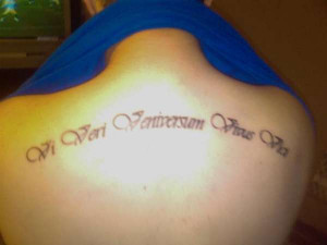 Latin phrase tattoo