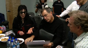 Michael Jackson, Kenny Ortega, and Bruce Jones reviewing story boards ...