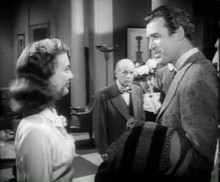 Miss Kelly (Peggy Dow) and Dowd ( James Stewart ). Judge Gaffney ...