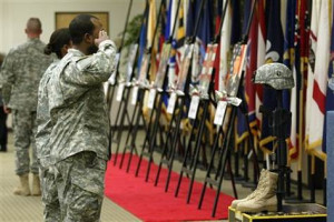 Image: Soldiers pay their final respects to 13 fallen soldiers