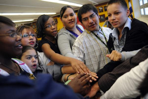 High School’s debate team huddle before the Baker Hostetler Debate ...