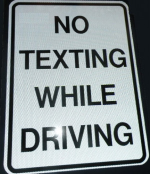 No Texting While Driving Sign by Lightcast Networks