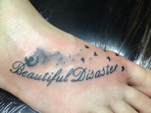Beautiful Disaster Quote Tattoo On Right foot