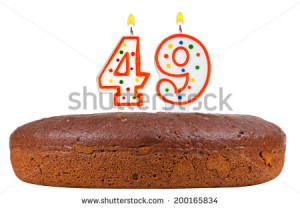 birthday cake with candles number forty nine isolated on white ...