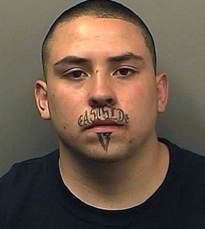 This is Anthony Garcia, a gang member with a tattoo of a murder he ...