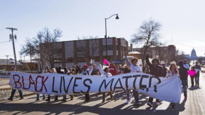 People march Sunday, March 8, 2015, in Madison, Wis., following the ...