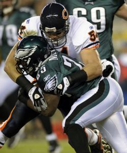 Gruden speaking of Brian Urlacher following a rather routine tackle.