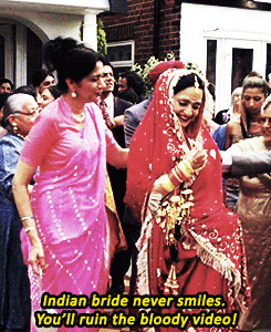 ... Don't smile. Indian bride never smiles. You'll ruin the bloody video