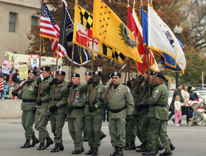 Vietnam veterans group marches in the parade to celebrate the 25th ...
