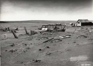 Farm buried in dust during the Dust Bowl Years.