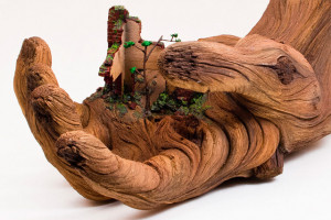 Cycle of Decay: A Sculpted Ceramic Hand that Looks Like a Carved Tree ...
