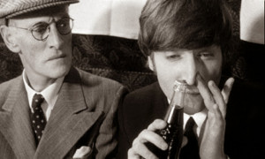 Wilfrid Brambell is looking at John Lennon while he's smorting coke ...