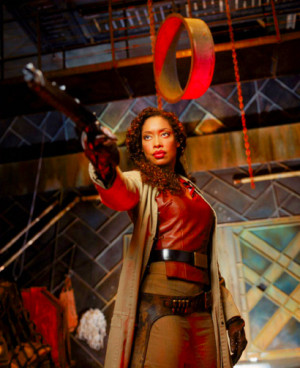 Zoe, played by Gina Torres