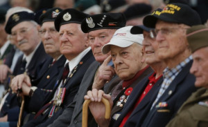 Day veterans attend a commemorative badge ceremony at the Regional ...