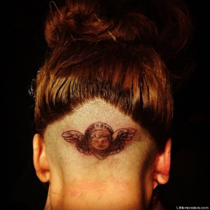 Gaga opted to have the inking on the back of new newly scalped head ...