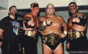 ... World Six Man Tag Team Champions - Dusty Rhodes and The Road Warriors