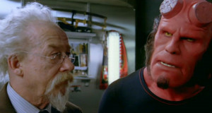 ... Perlman (Hellboy) and John Hurt (Trevor Bruttenholm) in Hellboy (2004