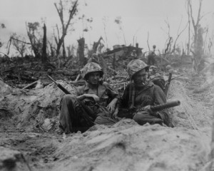 ... time out for a cigarette, while mopping up the enemy on Peleliu Is