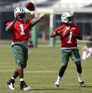 Jets quarterback Geno Smith runs with the ball during an NFL football ...