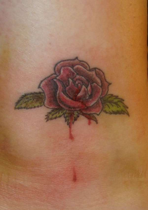 MissKitKats Bleeding Rose tattoo