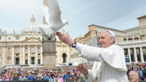 Pope Francis releases a white dove in St Peter's Square (15 May 2013)
