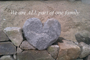 We are all part of one family [heart shaped rock]
