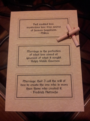 Scrolls with love and marriage quotes as wedding favours.